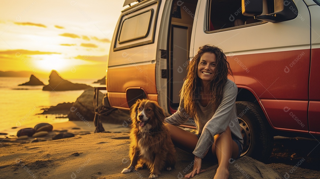 Mulher jovem e cachorro sentados na frente de sua van