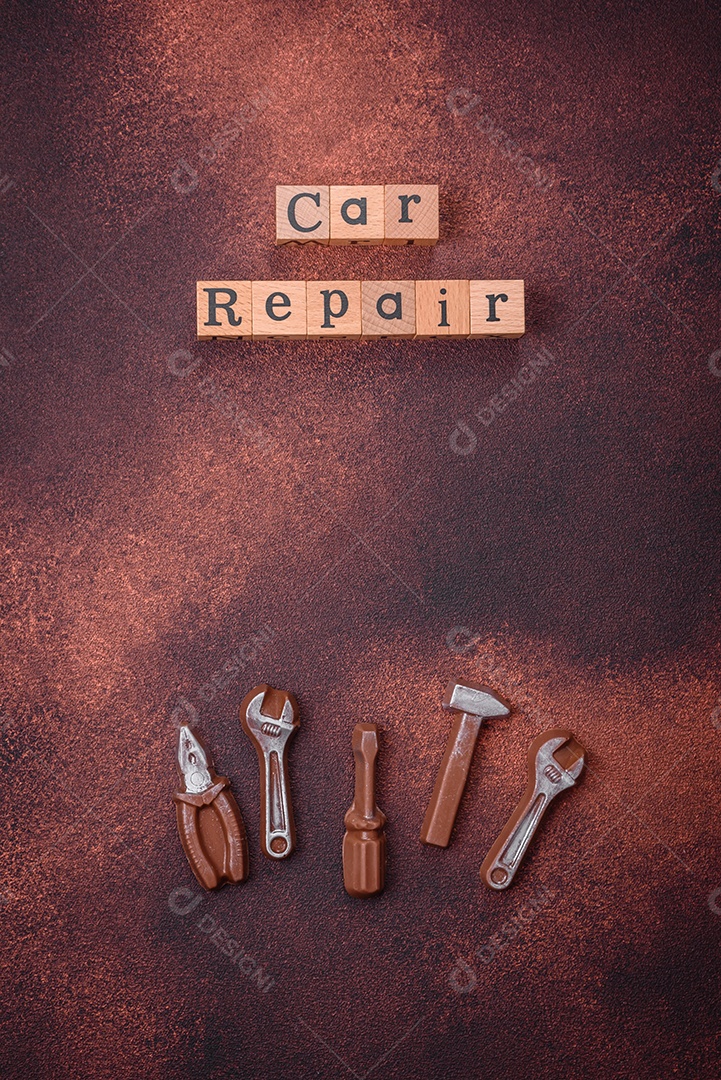 Ferramentas e inscrições simbolizando reparos ou garagem e seus atributos em fundo liso. Plano de fundo para o seu design