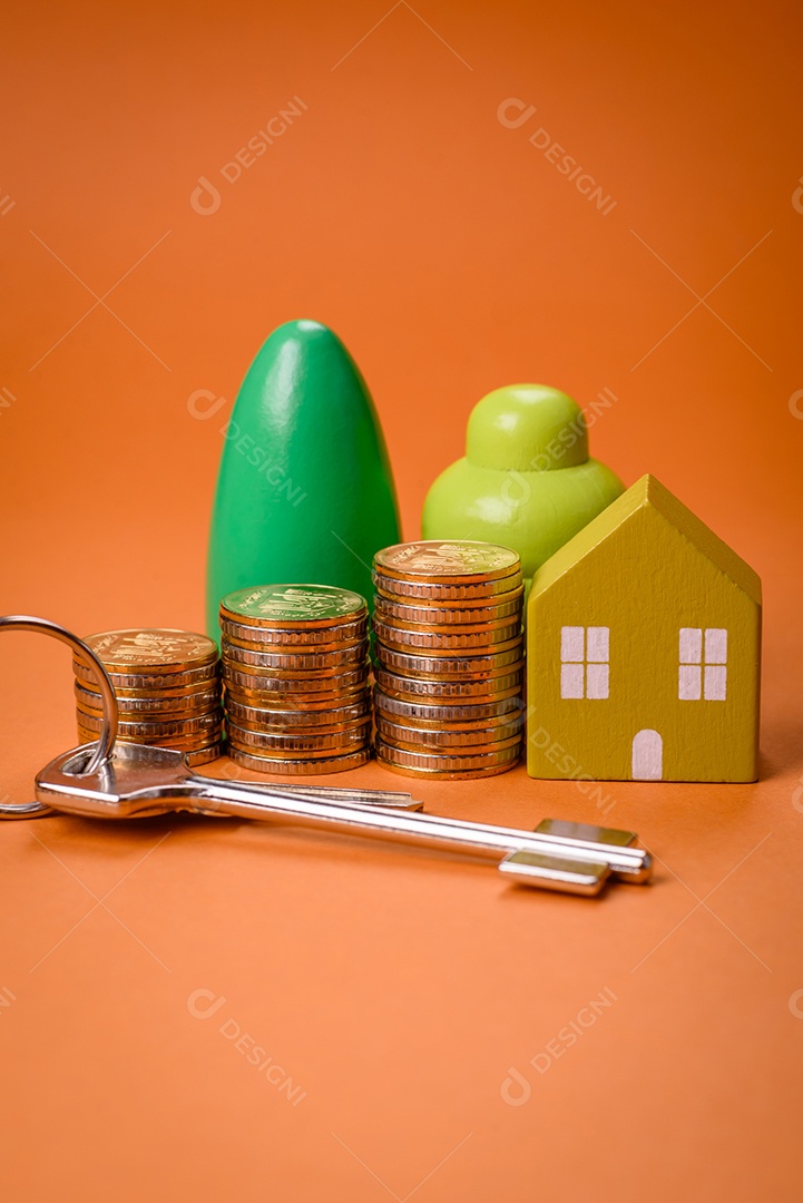 Uma casinha de madeira e chaves como ideia para investir na casa própria e atingir o objetivo de comprar um imóvel. Plano de fundo para sua ideia