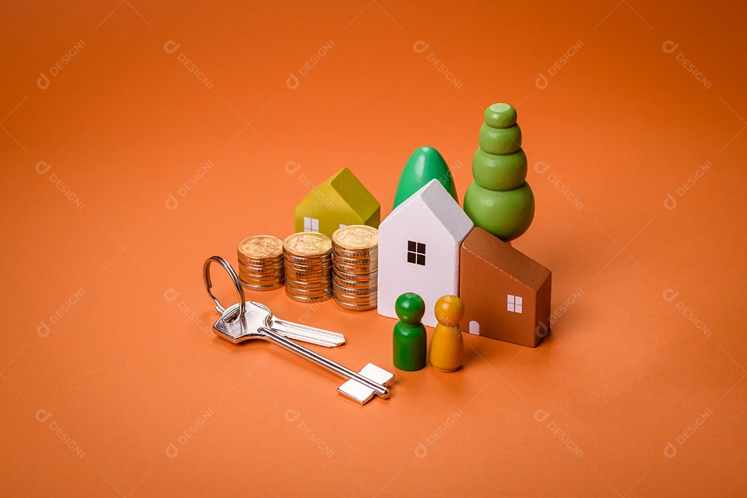 Uma casinha de madeira e chaves como ideia para investir na casa própria e atingir o objetivo de comprar um imóvel. Plano de fundo para sua ideia