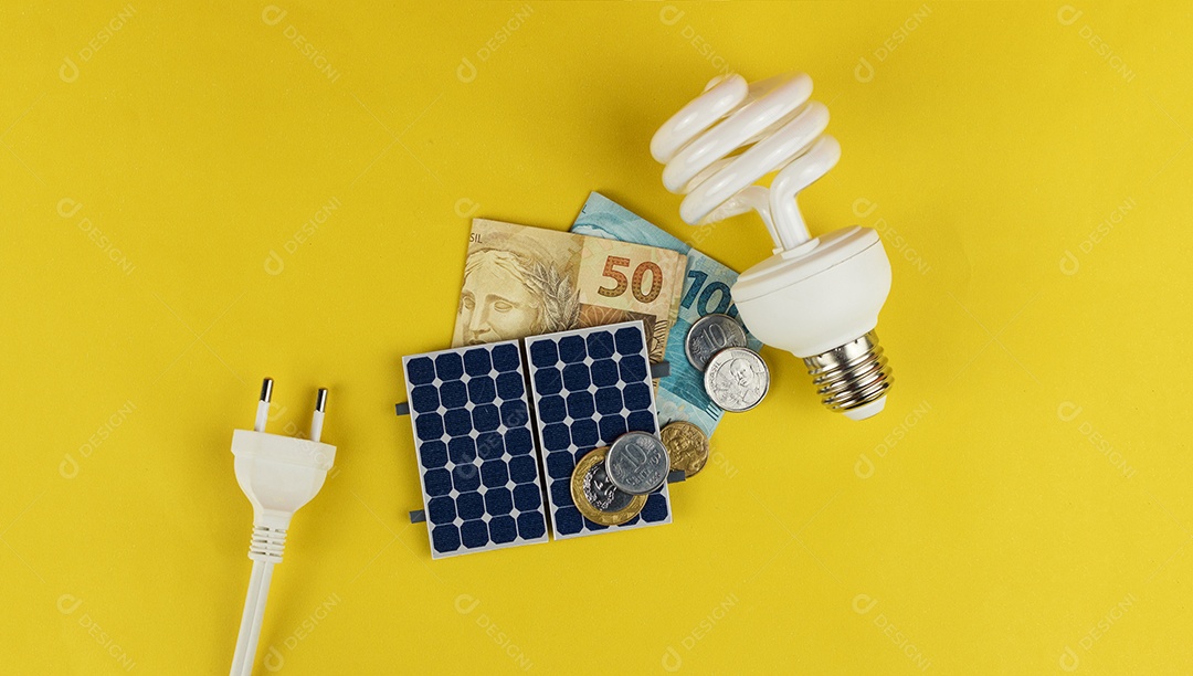 Painel fotovoltaico dinheiro e fio plug isolado em fundo amarelo painel solar com valores variados de dinheiro brasileiro