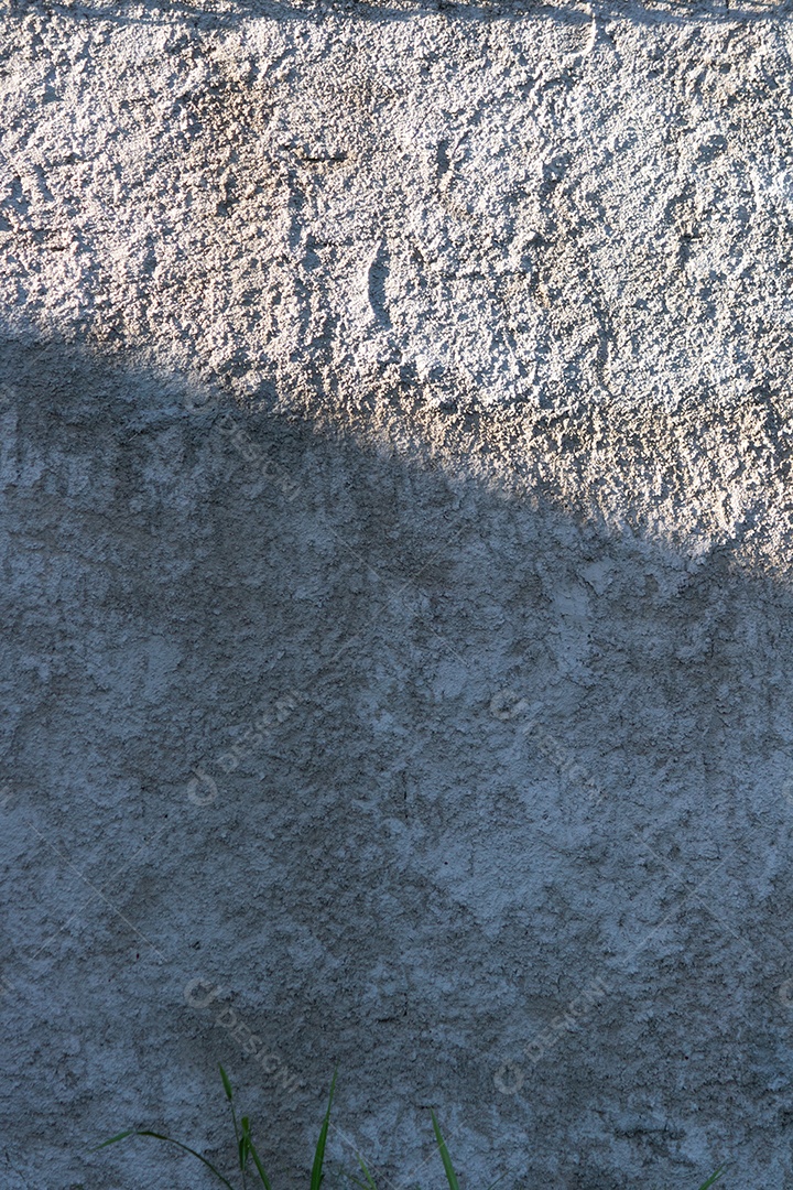 Parede rebocada com textura de cimento