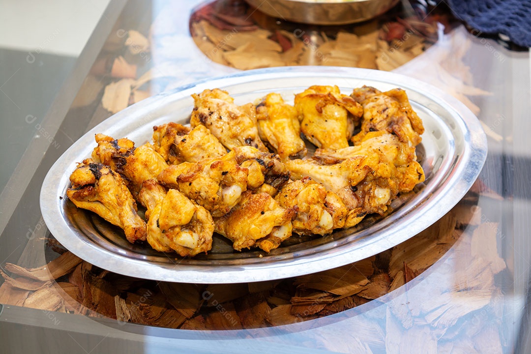 Porção coxinha de frango frito.