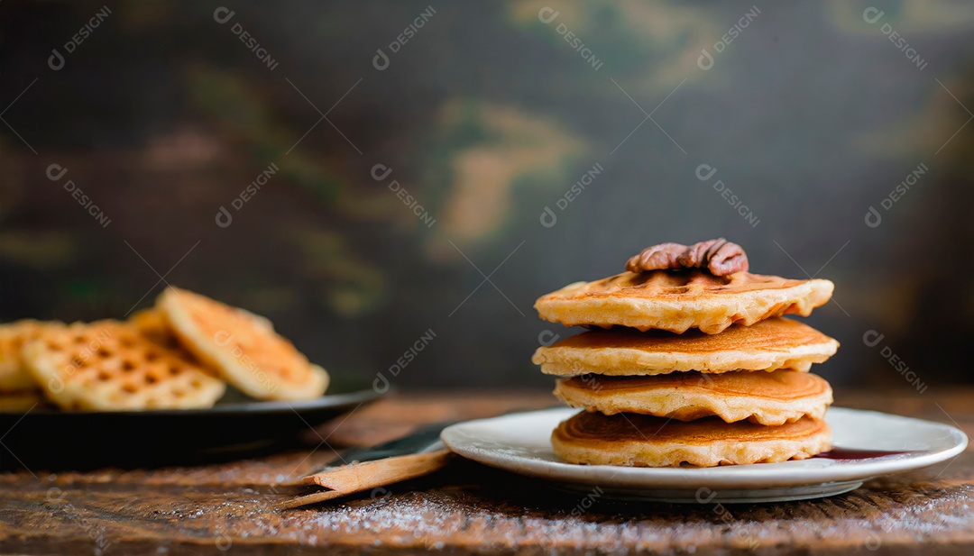 Waffle over dish on a wooden table