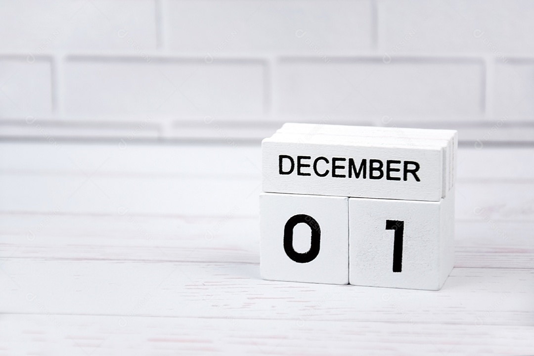 O calendário perpétuo de madeira branca mostrando o dia 1º de dezembro