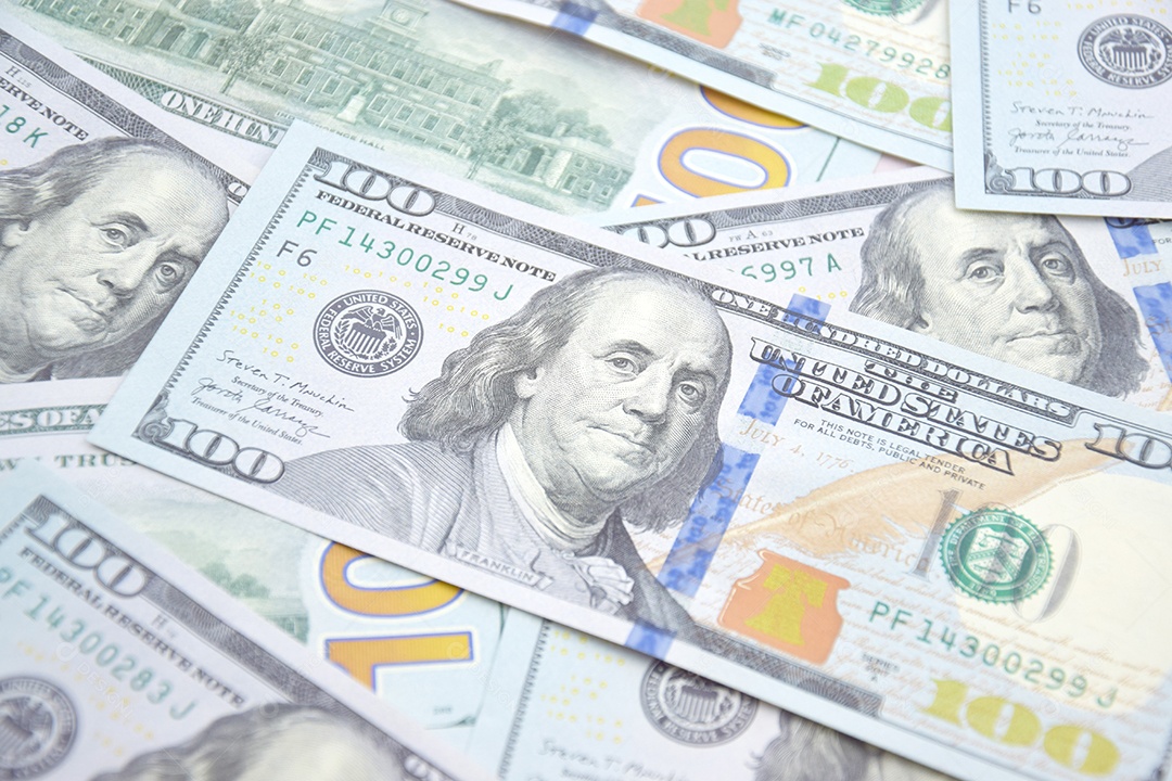 Dólares americanos e hryvnia ucraniana ajuda americana à Ucrânia na guerra