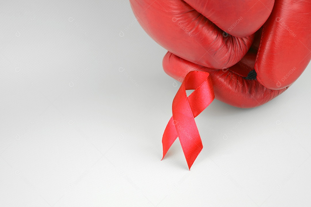 Conscientização para aids HIV câncer representado por fita vermelha