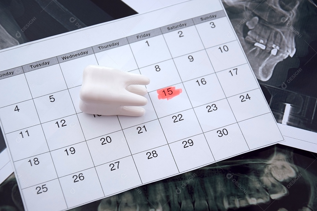 Calendário com figura de dente e instantâneo panorâmico
