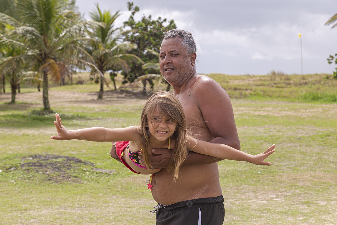 Pai ao lado de sua filha