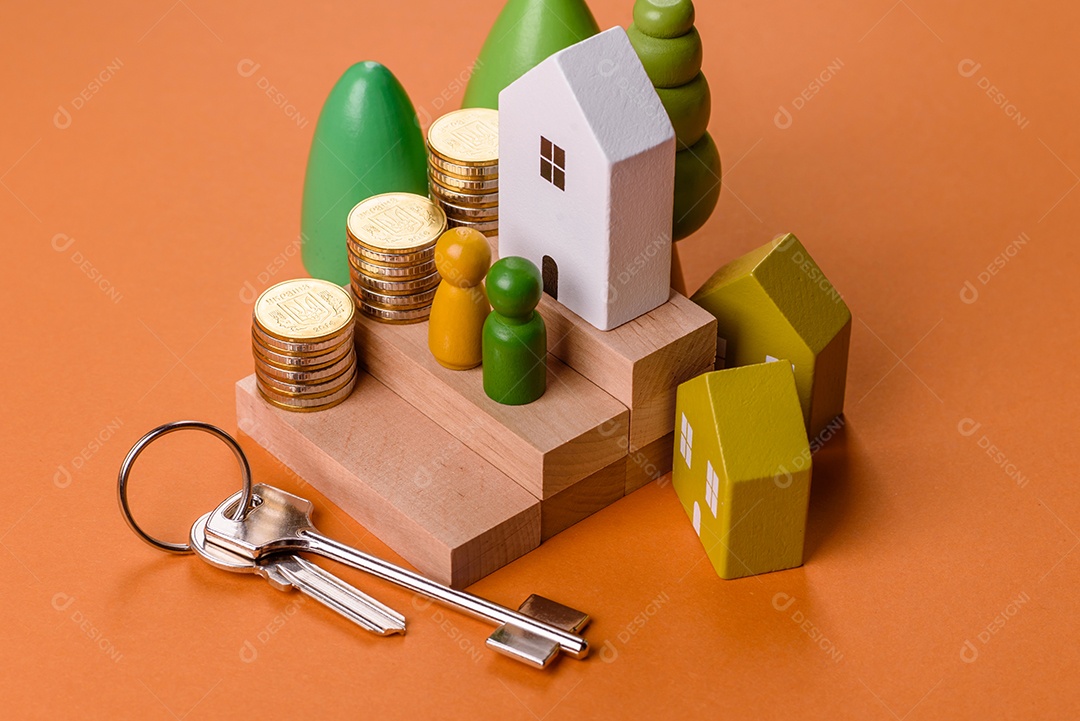 Uma casinha de madeira e chaves como ideia para investir na casa própria e atingir o objetivo de comprar um imóvel. Plano de fundo para sua ideia
