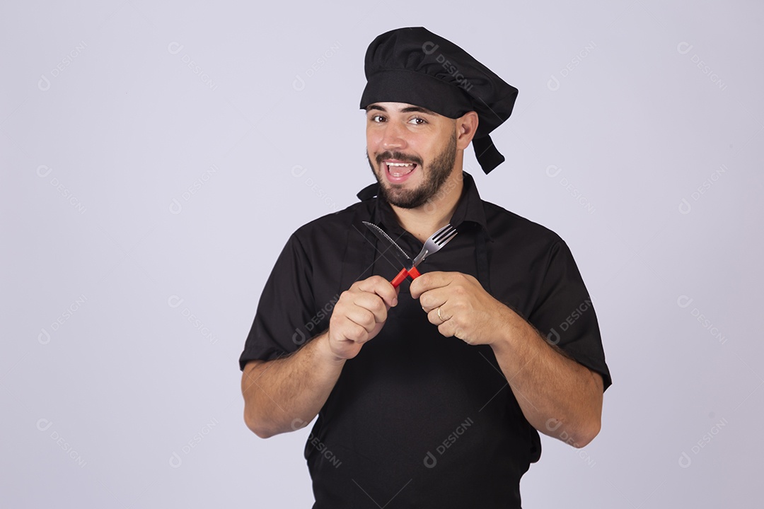 Homem jovem cozinheiro sobre fundo isolado