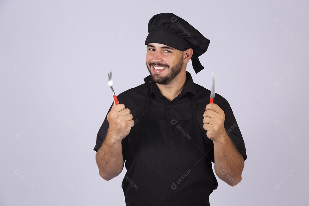 Homem jovem cozinheiro sobre fundo isolado