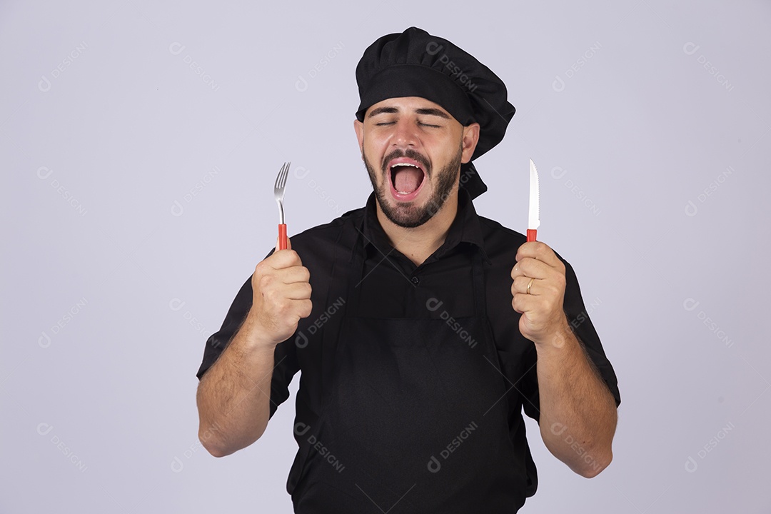 Homem jovem cozinheiro sobre fundo isolado