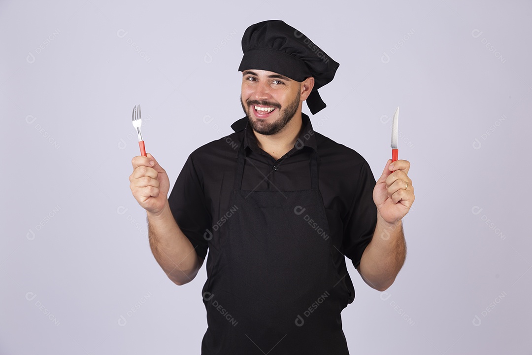 Homem jovem cozinheiro sobre fundo isolado