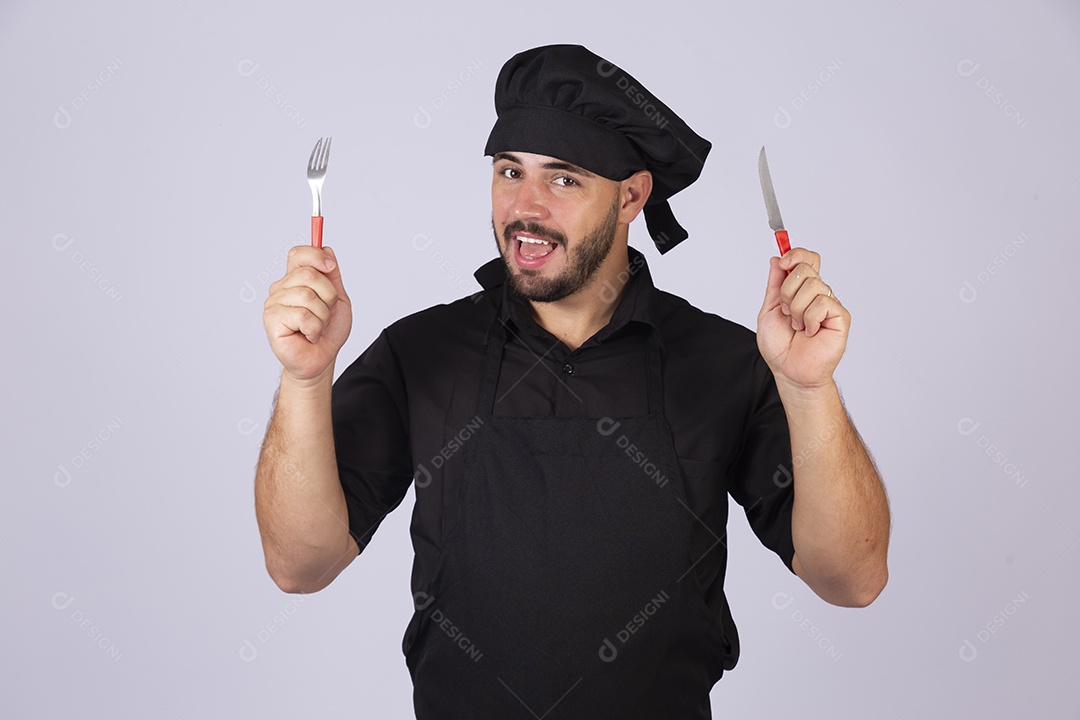 Homem jovem cozinheiro sobre fundo isolado