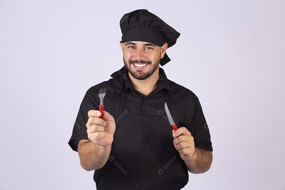 Homem jovem cozinheiro sobre fundo isolado