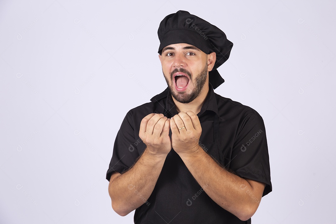 Homem jovem cozinheiro sobre fundo isolado
