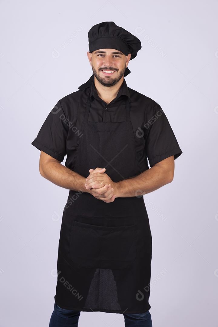 Homem jovem cozinheiro sobre fundo isolado