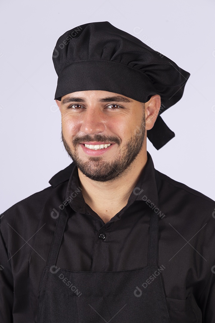 Homem jovem cozinheiro sobre fundo isolado