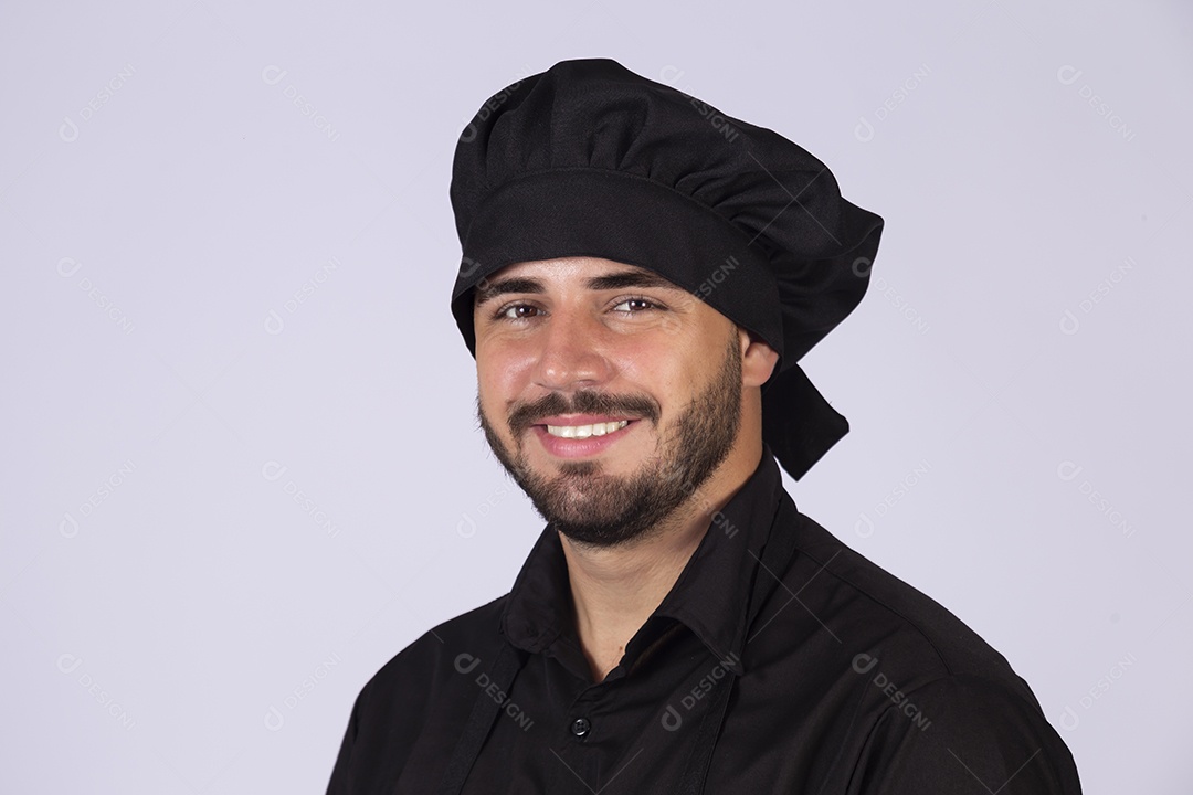 Homem jovem cozinheiro sobre fundo isolado