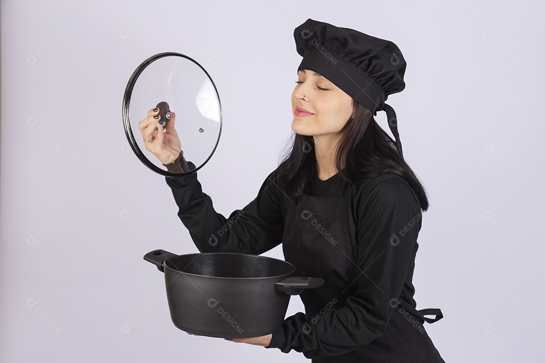 Linda mulher jovem chefe de cozinha