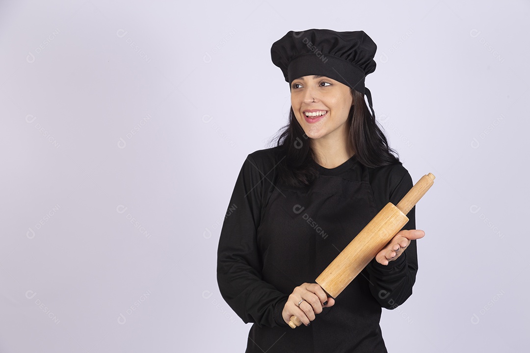 Linda mulher jovem cozinheira sobre fundo isolado