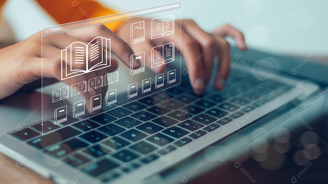 Uma pessoa está digitando em um laptop com um ícone de livro na tela