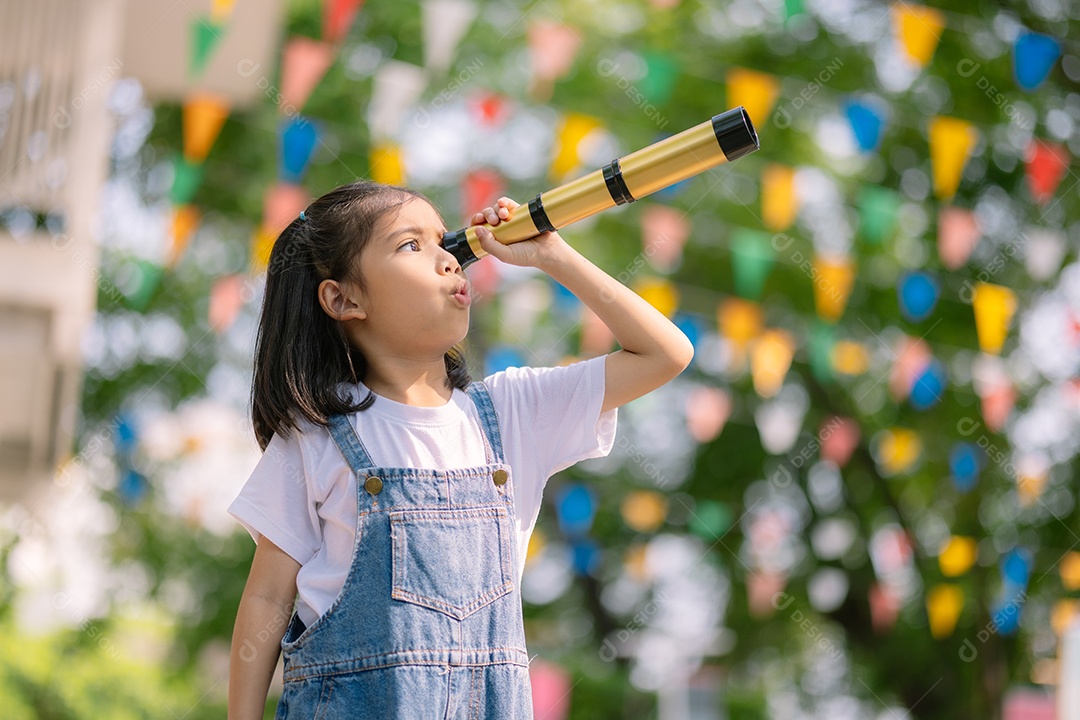 A little girl looking through a researcher-playing telescope