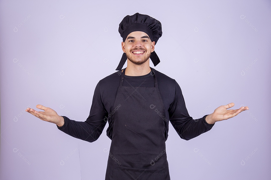 Homem jovem cozinheiro sobre fundo isolado