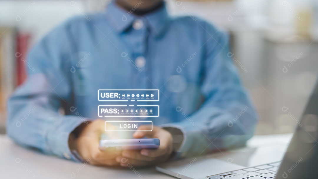 A tela do laptop mostra uma tela de login do usuário