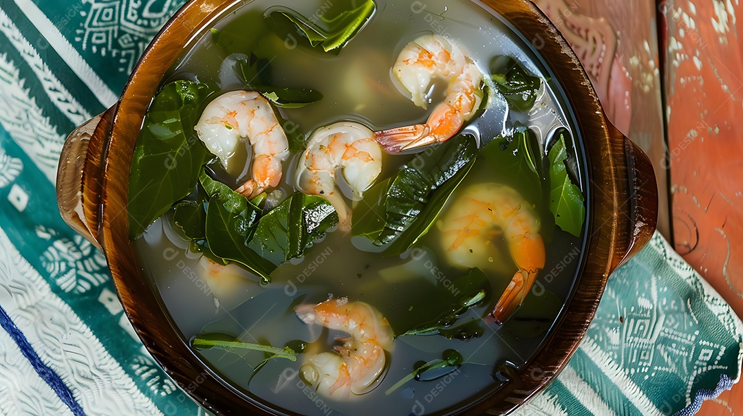 Tacaca uma sopa picante feita com folhas de jambu e camarão