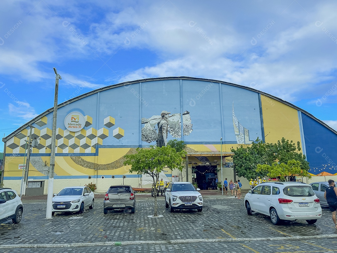 Carros sobre um Estacionamento de um ginásio