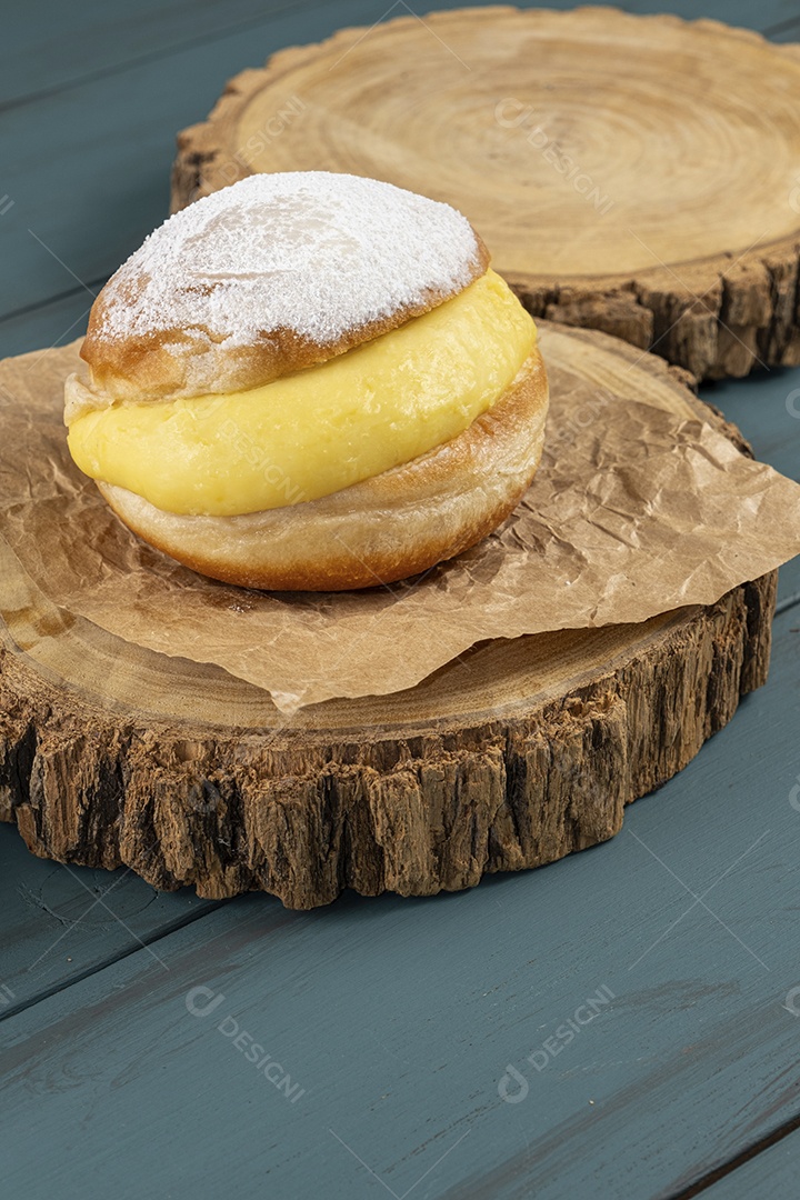 Cream Donuts on wooden board