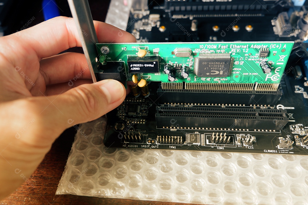 Man Hands Installing an Internet Plate Adapter