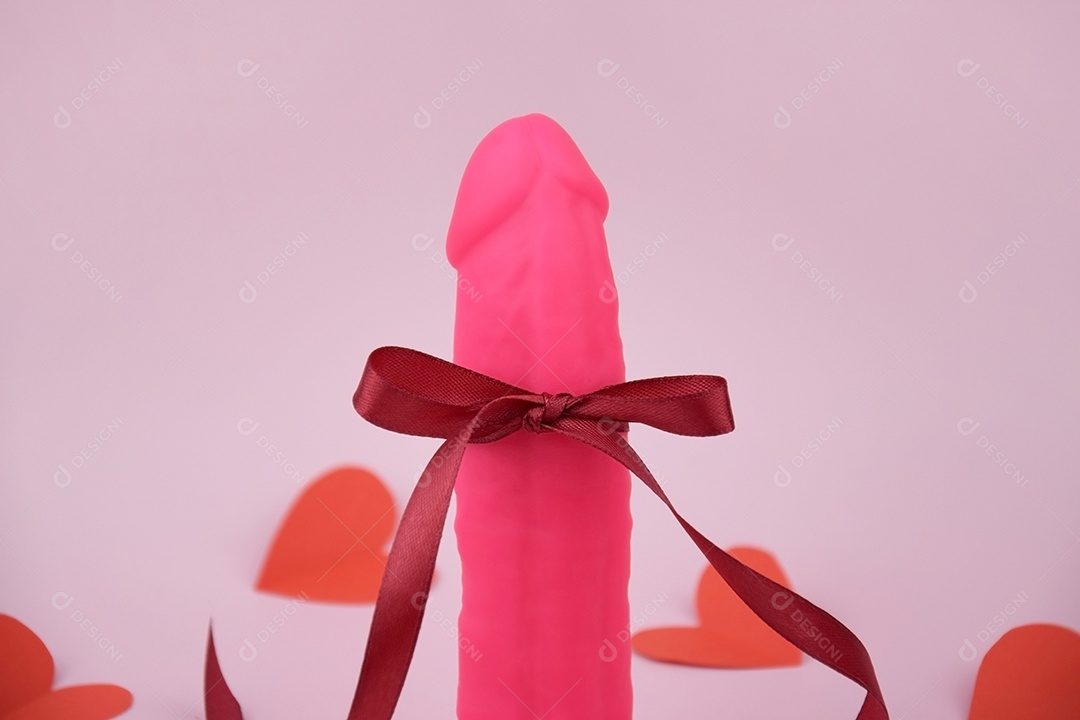 Vibrador rosa com laço