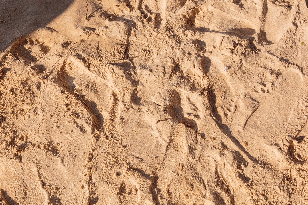 Areia com algumas pegadas
