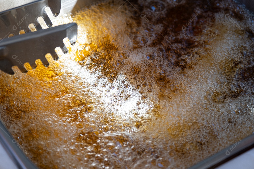 Gordura quente fritando churros