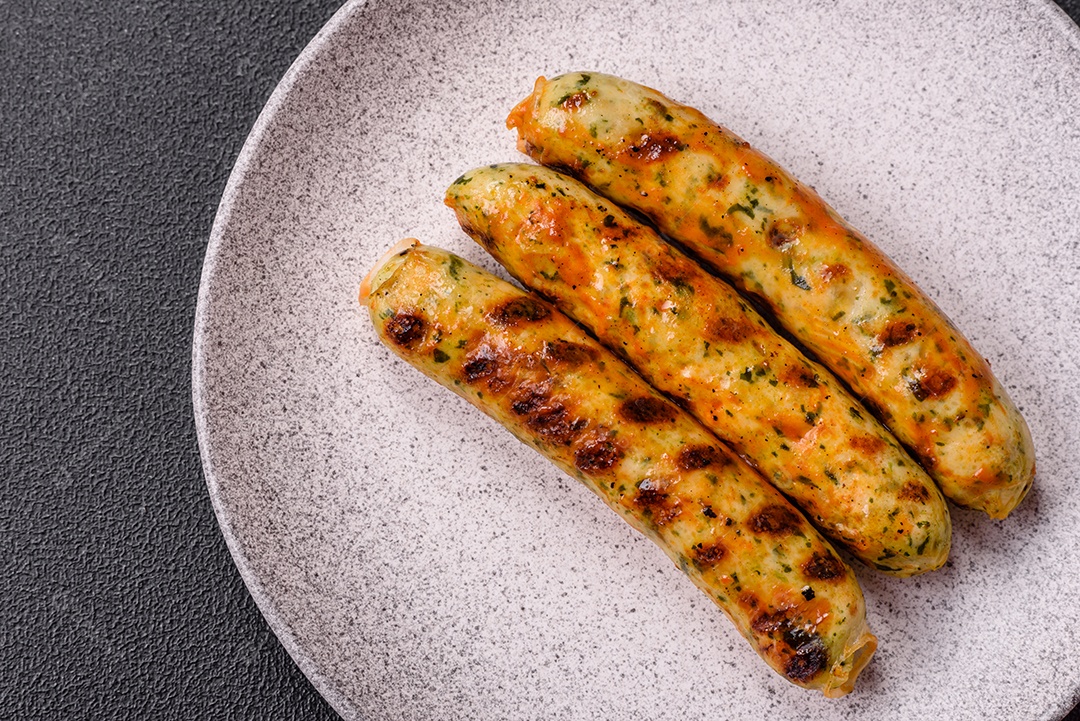 Vegan sausage on ceramic plate