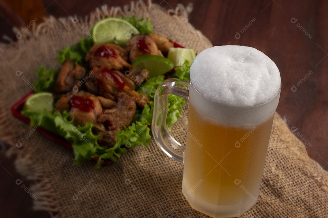 Cold beer mug with fried chicken portion