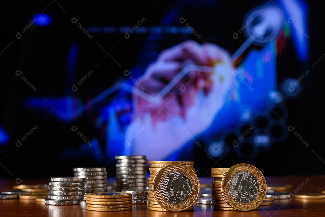 Many coins on wooden table