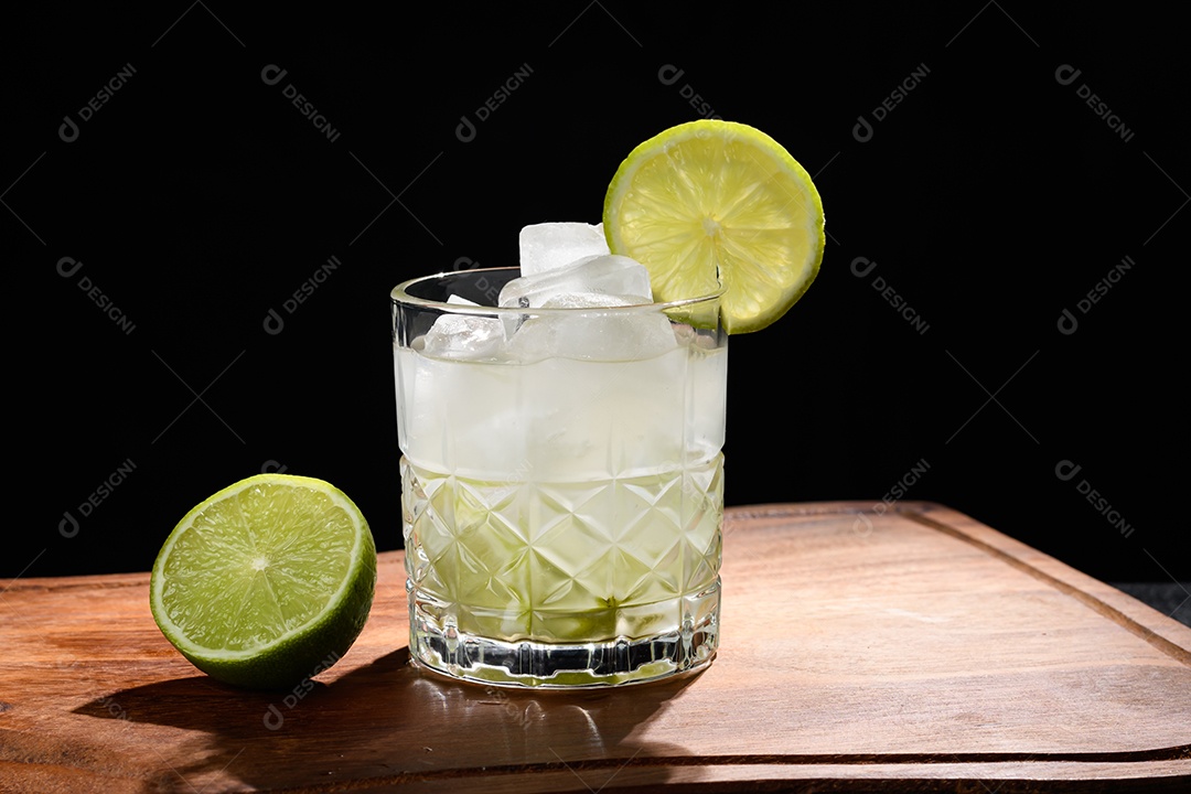Delicious caipirinha on a wooden board