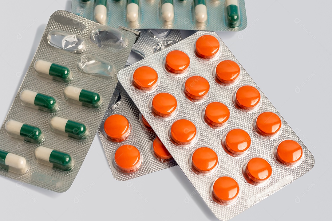 White green and orange tablets