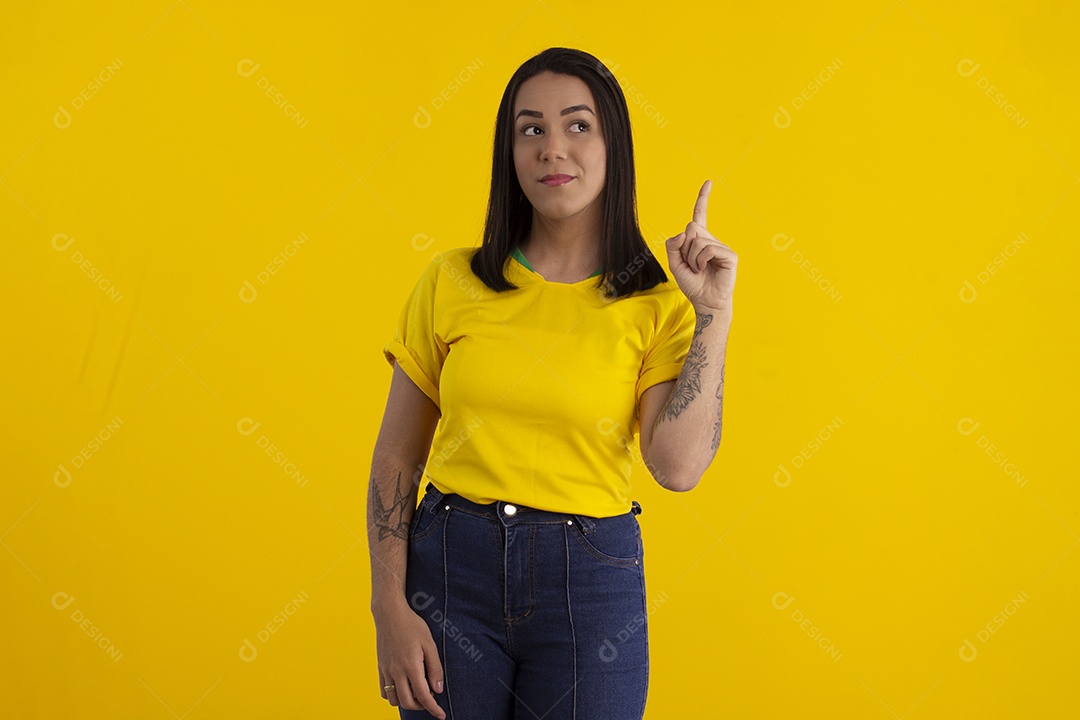 Young looking and pointing up