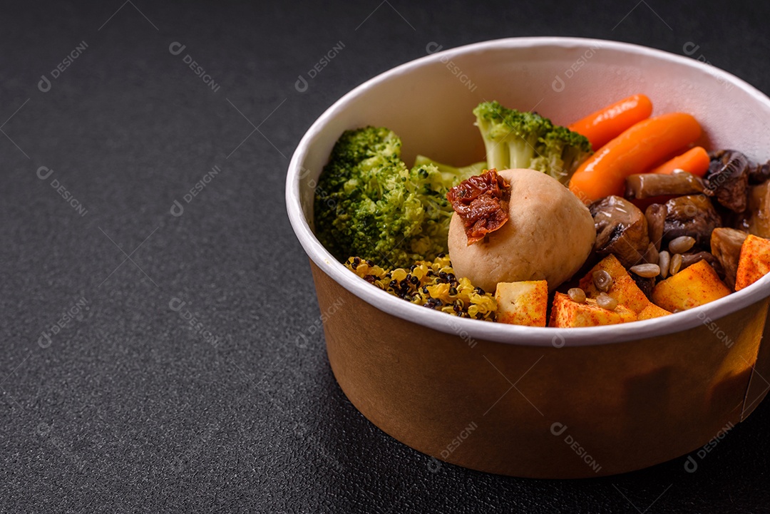 Legumes e verduras em prato em uma mesa de concreto