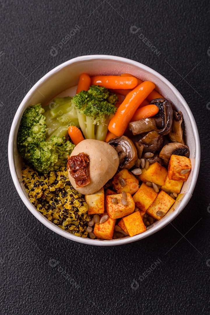 Legumes e verduras em prato em uma mesa de concreto