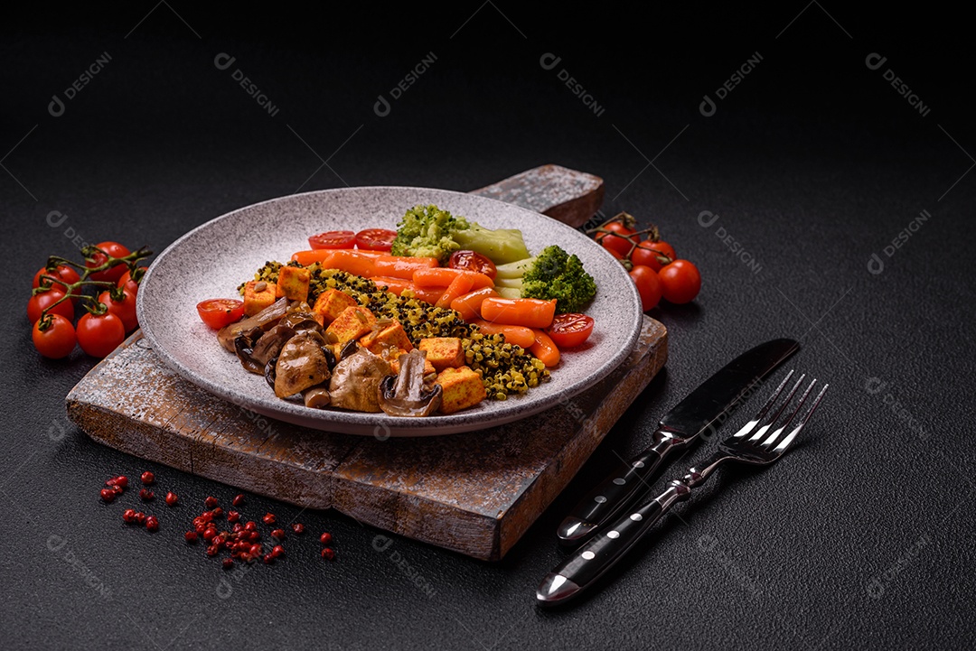Legumes e verduras em prato em uma mesa de concreto