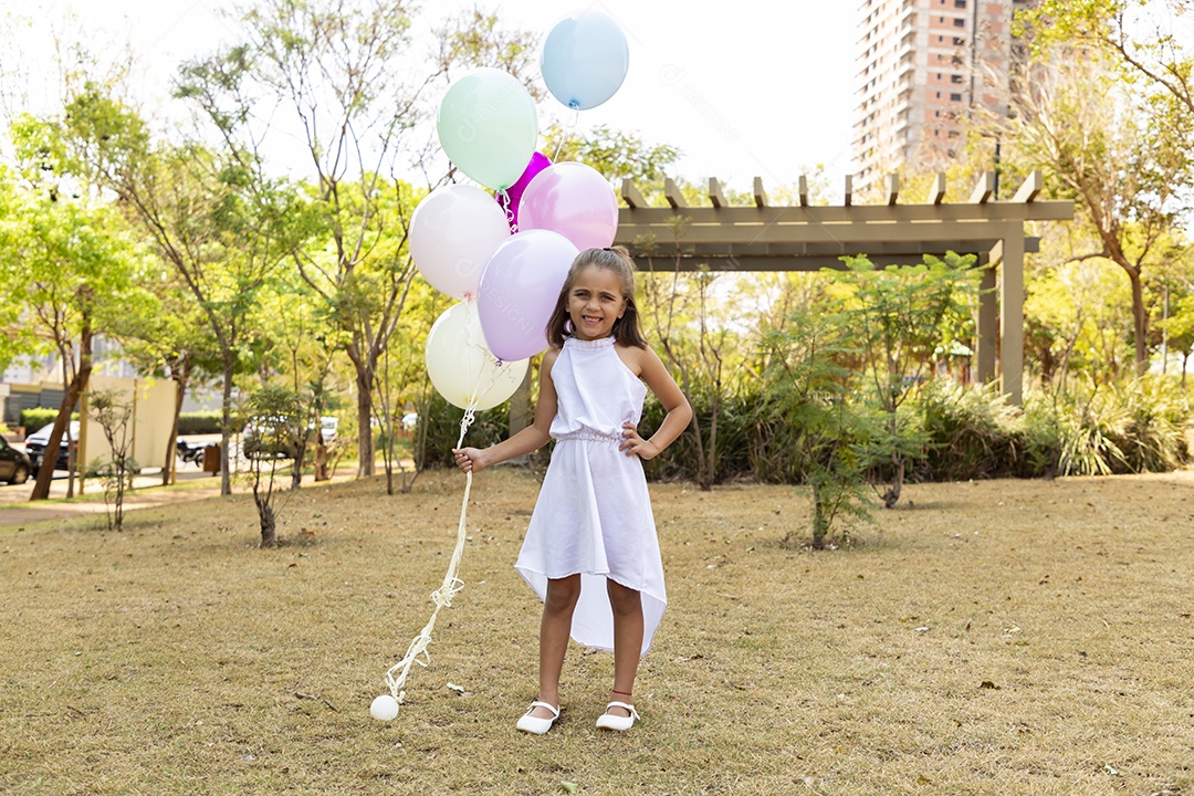 Beautiful and happy girl posing for birthday photos