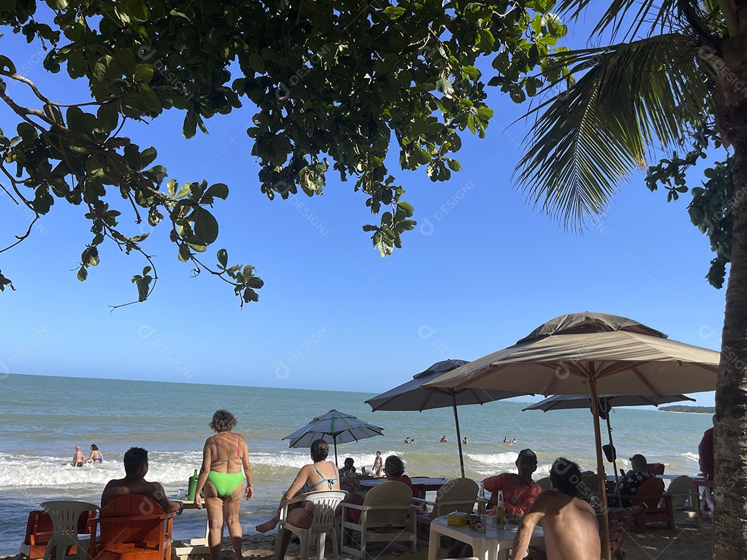 Beach shadow and many people having fun