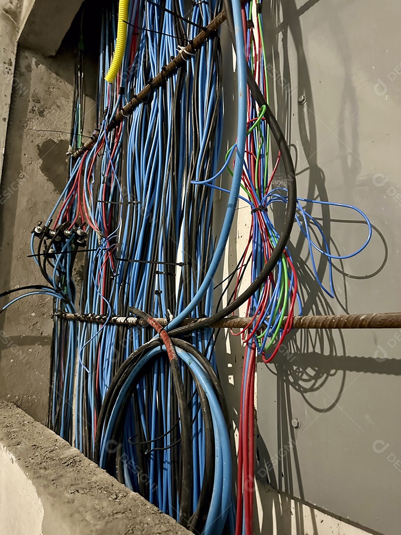 Electrical wires and cables being installed in a construction