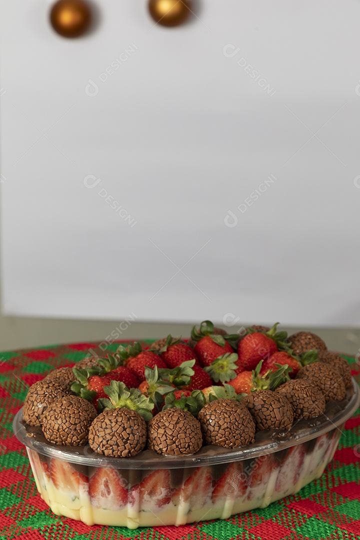 Table decorated for Christmas with a delicious sweet dessert